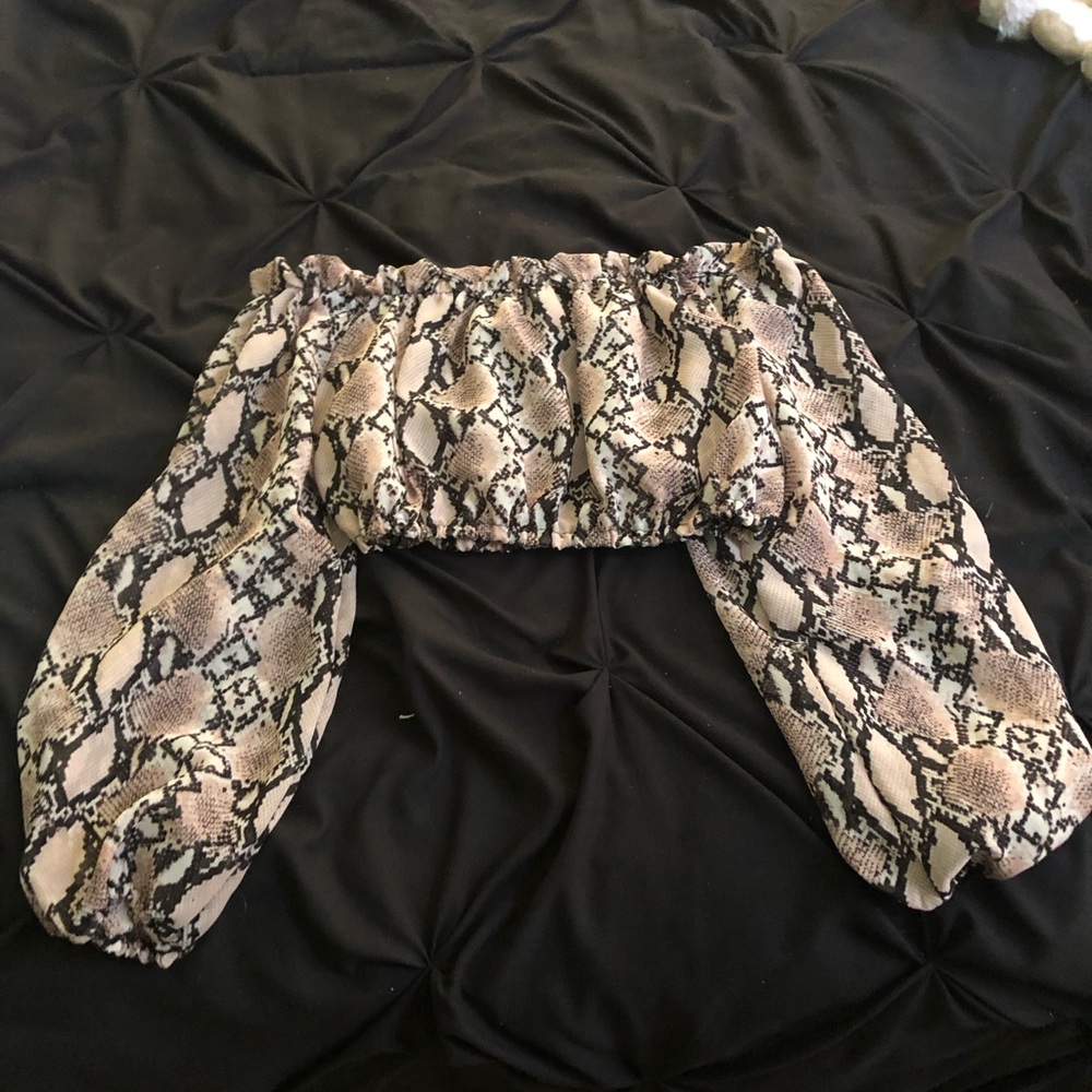 Off the shoulder tube top, can be a bathing suit cover up or a top, never worn